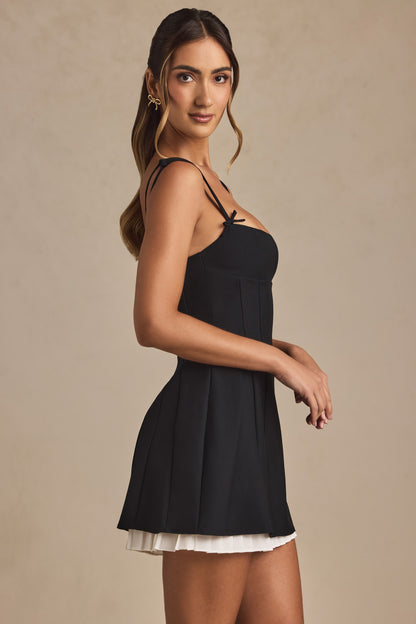 Bow-Detail Pleated A-Line Mini Dress in Black